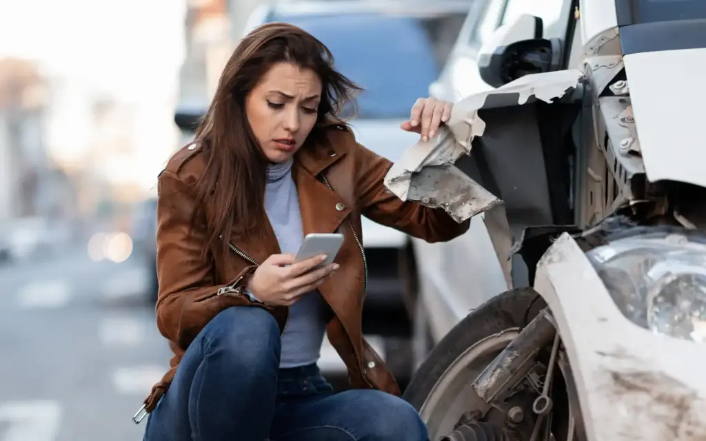 Lady calling Perron Law Office after car accident