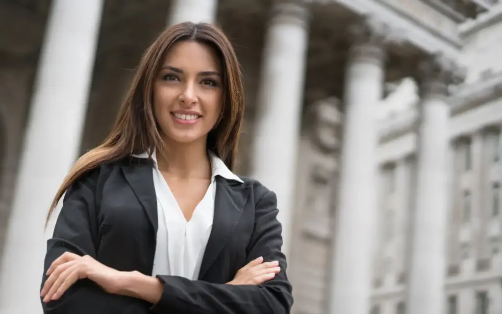 Female attorney in front of courthouse